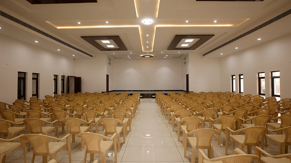 Elegant interior of the fully air-conditioned banquet hall at Vaibhav Mahal Coimbatore with modern amenities.