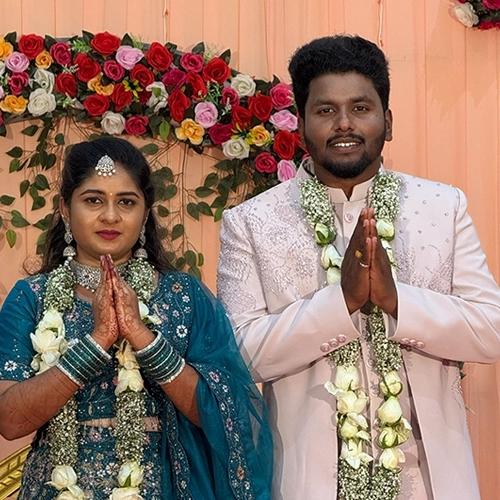 Elegant engagement function hall with stage, seating, and decor for joyful family ring ceremonies