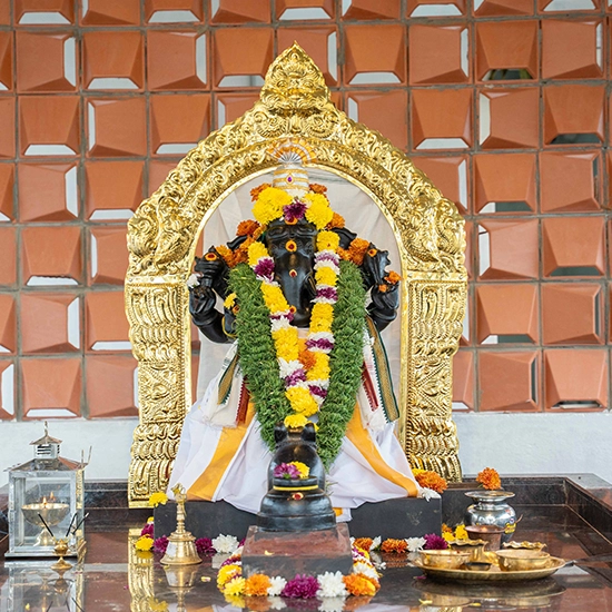 Lord Ganesha idol symbolizing auspicious beginnings and blessings during traditional ceremonies