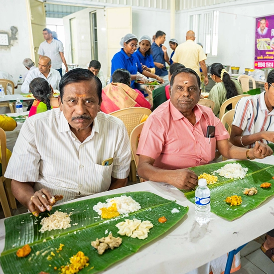 Traditional wedding lunch service arranged to serve guests fresh meals in an organized dining space